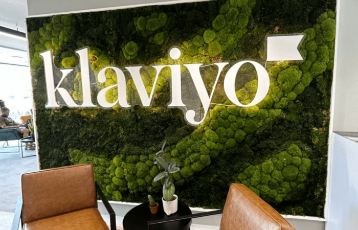 klaviyo green and illuminating feature wall
