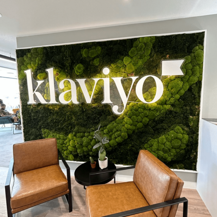 klaviyo green and illuminating feature wall