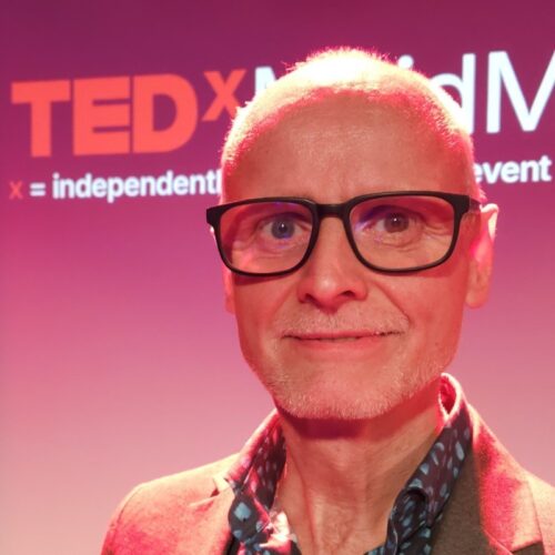 headshot of tony brooks a man with glasses