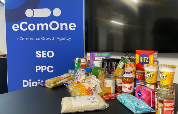 a range of food to be donated on a table in ecomone office